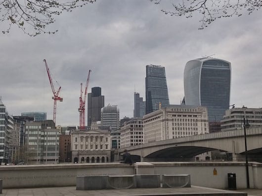 Sitting on the dock of the bay. The inscription readers "There are two things scarce matched in the universe the sun in heaven and the Thames on earth. Sir Walter Raleigh"