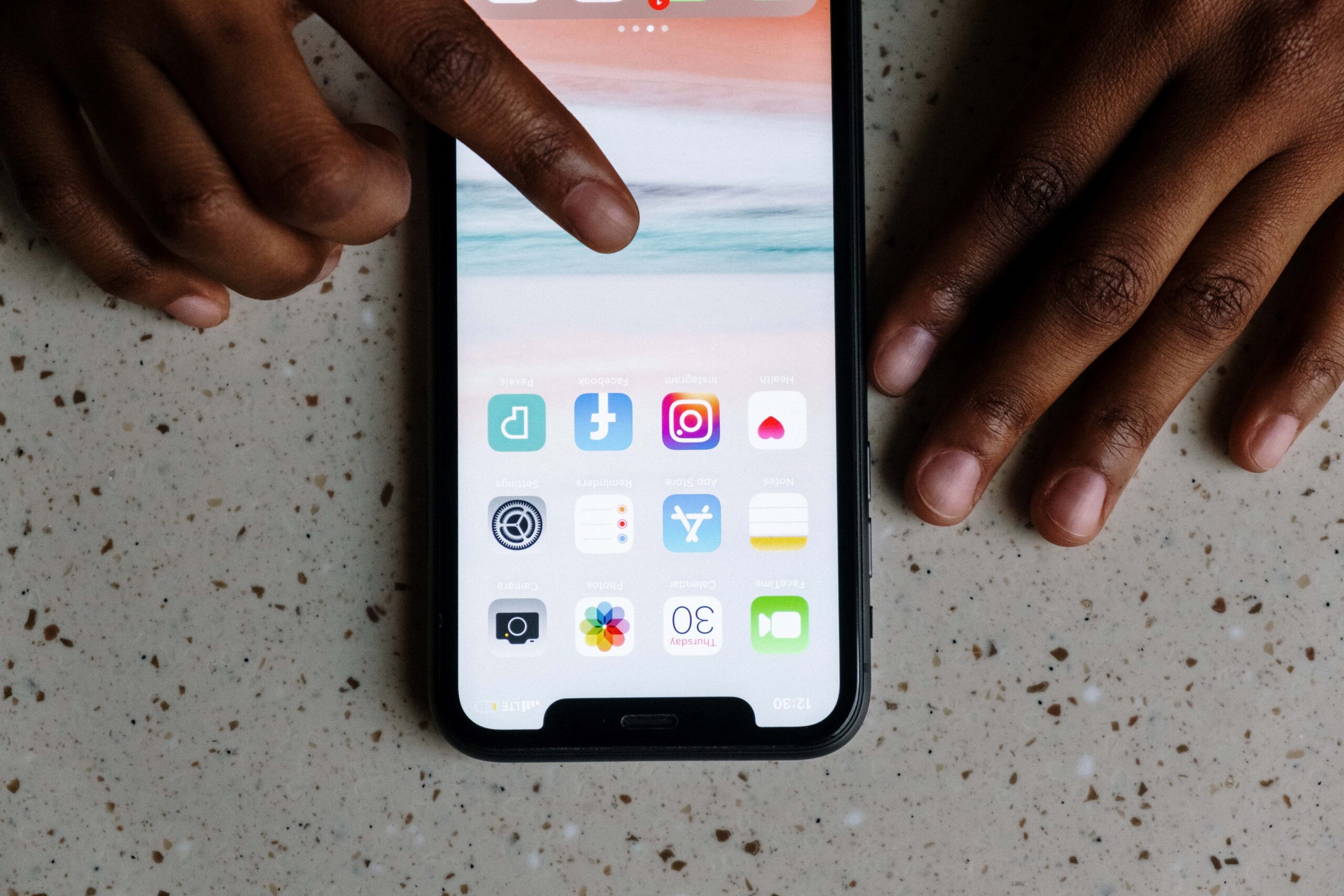 Hands using a smartphone